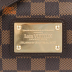 Louis Vuitton Eva Pochette Damier Ebene Brown