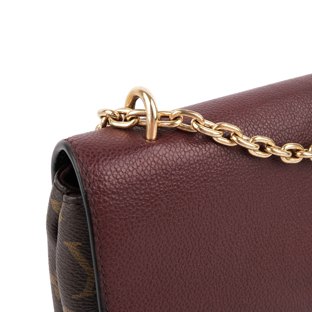 Louis Vuitton Saint Placide Monogram Canvas and Grain Leather in Bordeaux M43715