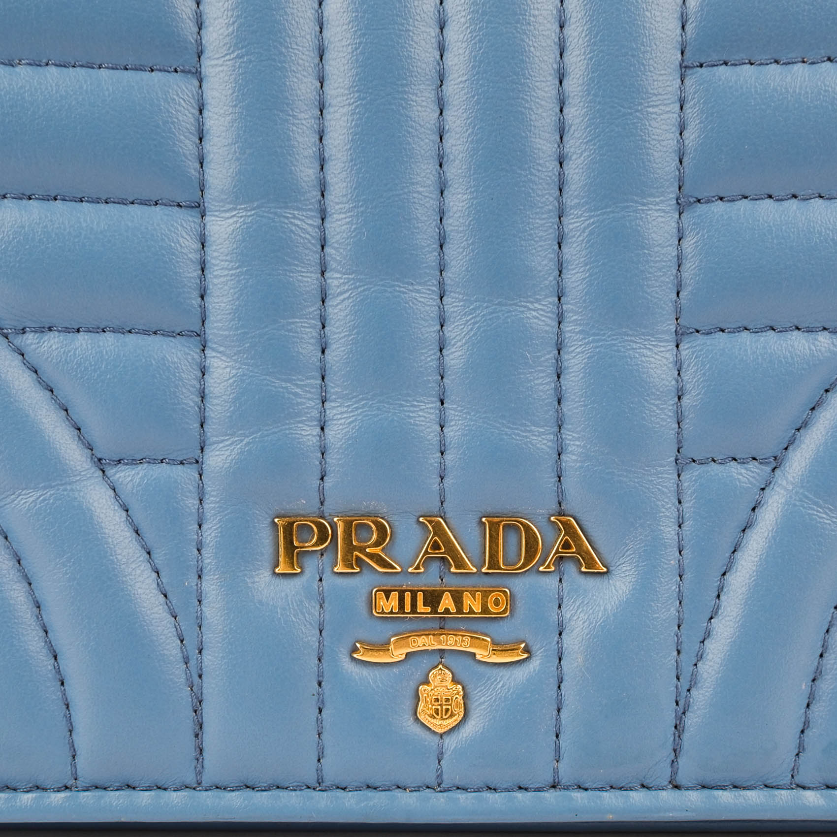 PRADA Diagramme Leather Wallet on Chain (WOC) - Astrale Blue - Model 1ZH044